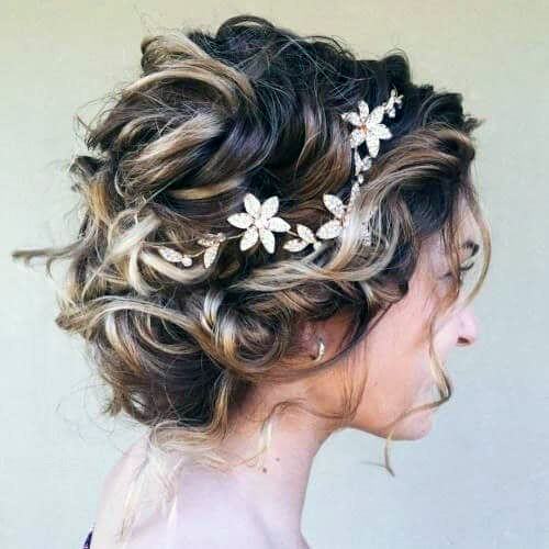 Prom Hairstyle Wavy Shag Pulled Into Updo And Flower Headpiece