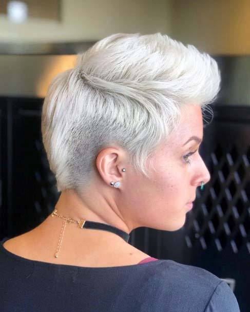 Punk Rock Inspired Platinum Blonde Voluminous Pixie Hairstyles For Women