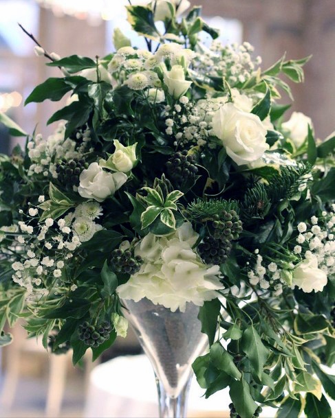 Pure White Christmas Flowers And Greens Wedding