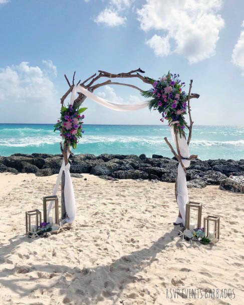 Purple Arched Beach Wedding Flowers