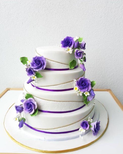 Purple Bands And Roses Wedding Cake