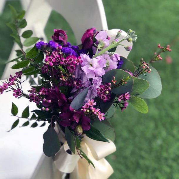 Purple Flowers Decorated Chair Wedding