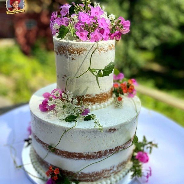 Purple Flowers On Country Wedding Cakes