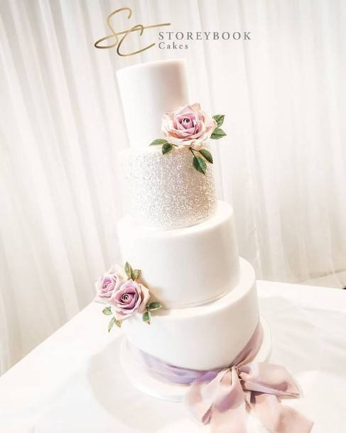 Purple Flowers On Pure White Beautiful Wedding Cakes