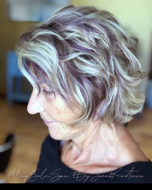 Purple Highlights Curly Bob Youthful Hairstyles Over 50