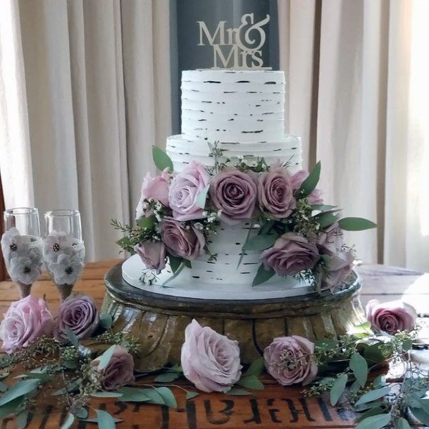 Purple Roses On 3 Tiered Wedding Cake Women