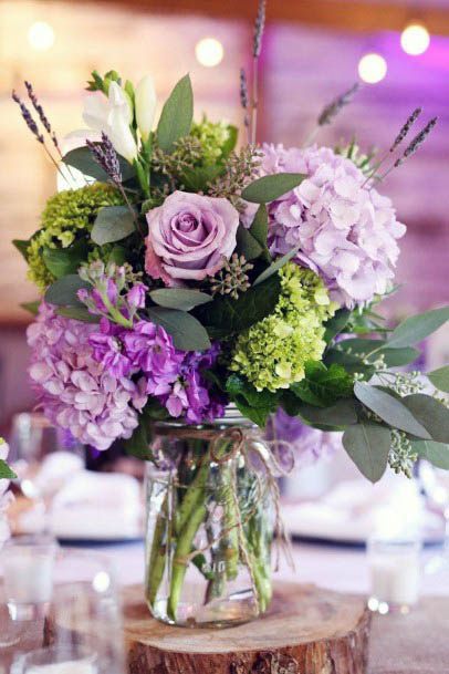 Purple Wedding Flowers In Glass Vase