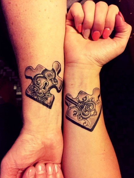 Puzzle Piece With Lock Couple Wrist Tattoo