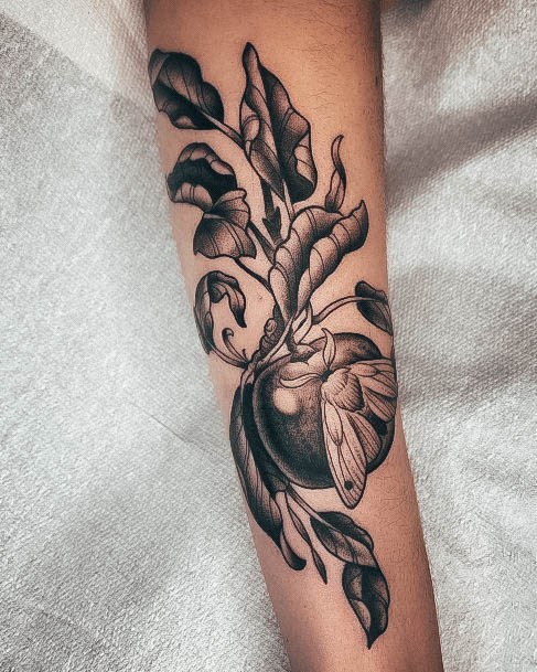 Ravishing Apple Tattoo On Female