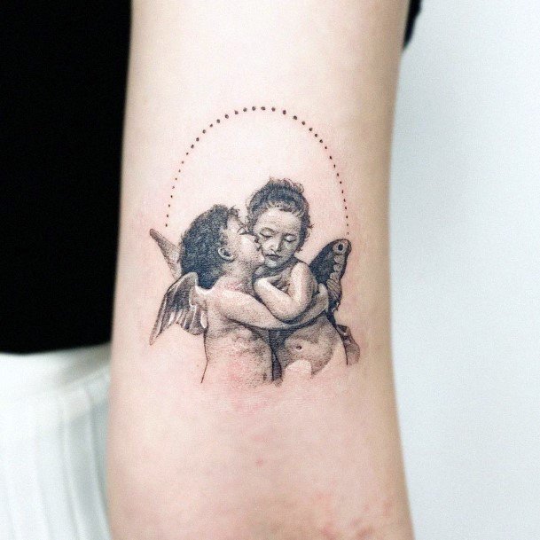 Ravishing Baby Angel Tattoo On Female