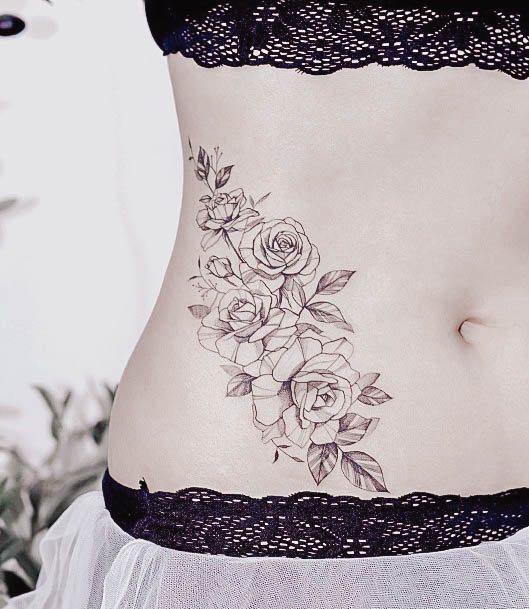 Ravishing Black Rose Tattoo On Female