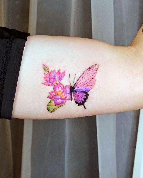 Ravishing Butterfly Flower Tattoo On Female