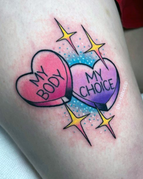 Ravishing Candy Heart Tattoo On Female