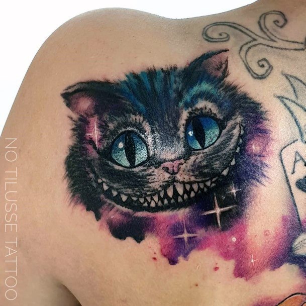 Ravishing Cheshire Cat Tattoo On Female