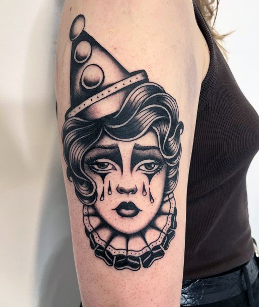 Ravishing Clown Tattoo On Female