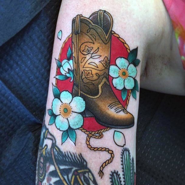 Ravishing Cowboy Boot Tattoo On Female