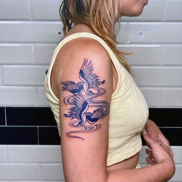 Ravishing Crane Tattoo On Female