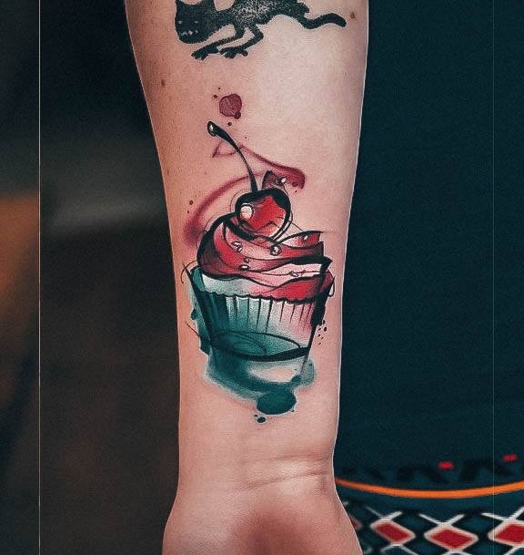 Ravishing Cupcake Tattoo On Female