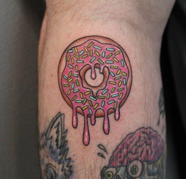 Ravishing Donut Tattoo On Female