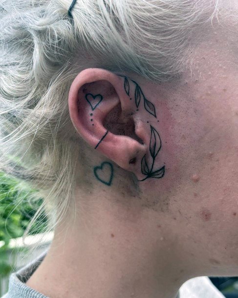 Ravishing Ear Tattoo On Female