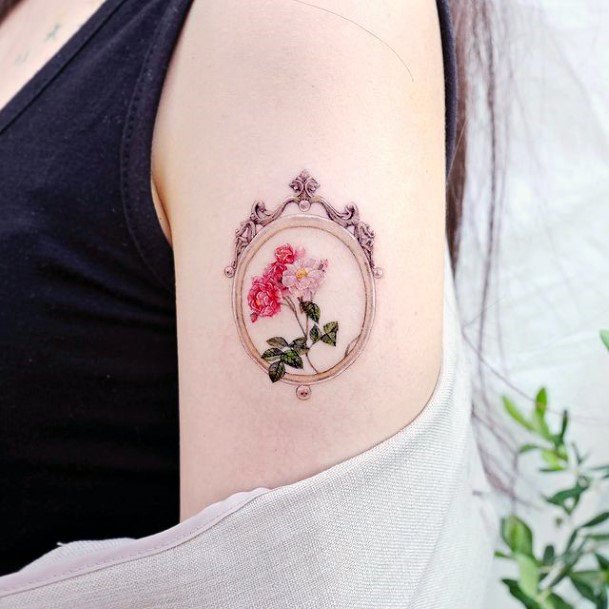 Ravishing Frame Tattoo On Female