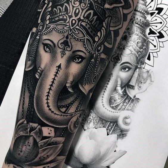 Ravishing Ganesha Tattoo On Female