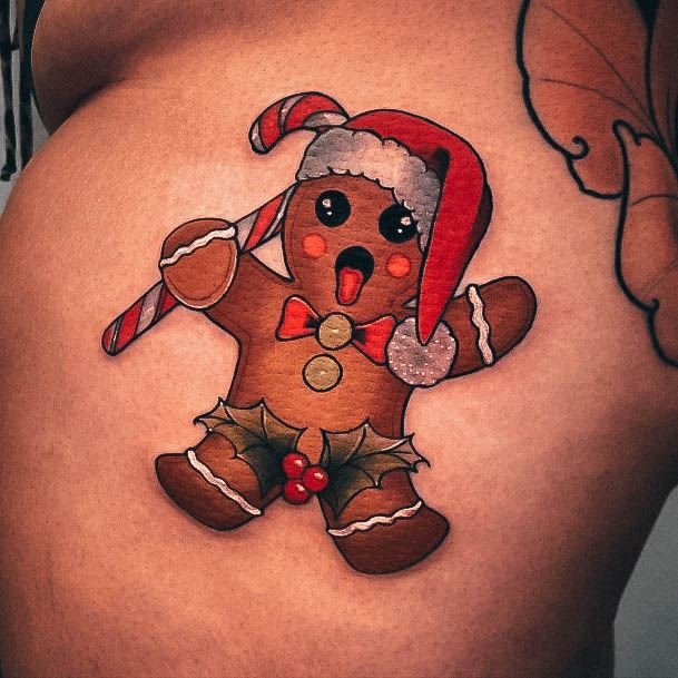 Ravishing Gingerbread Man Tattoo On Female