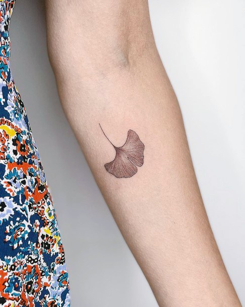Ravishing Ginkgo Tattoo On Female