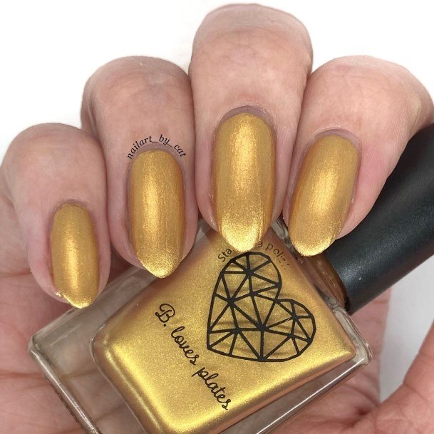 Ravishing Gold Nail On Female