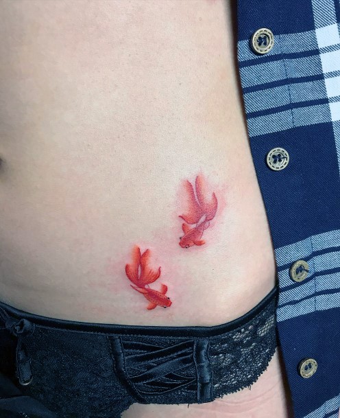 Ravishing Goldfish Tattoo On Female