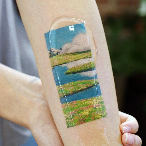 Ravishing Landscape Tattoo On Female