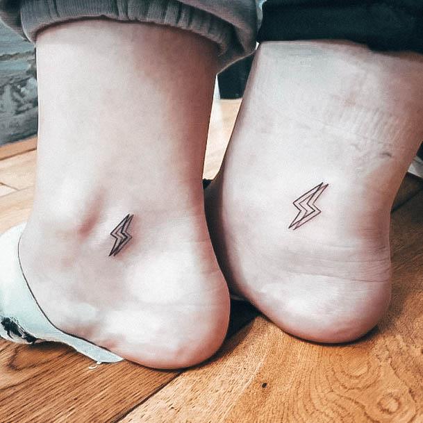 Ravishing Lightning Bolt Tattoo On Female