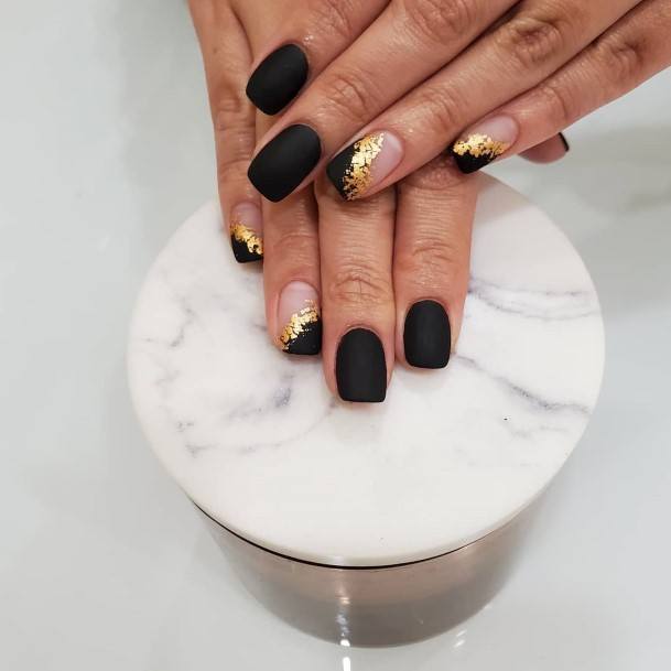 Ravishing Matte Black And Gold Nail On Female