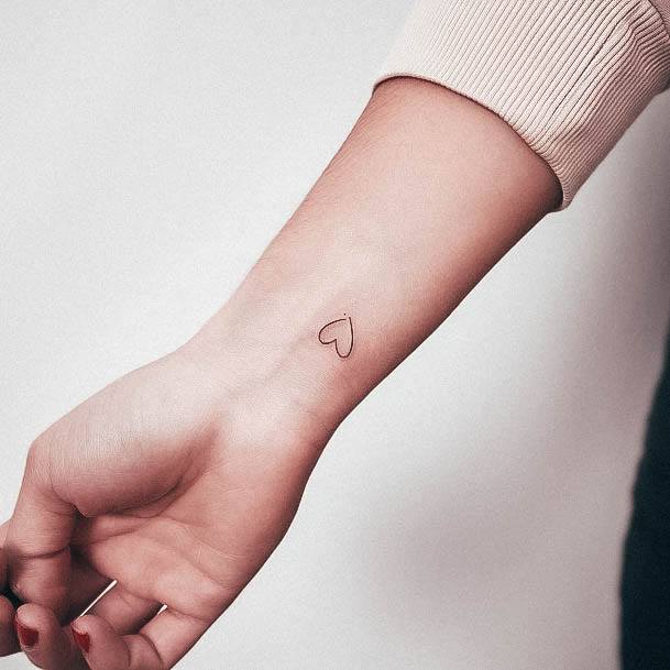 Ravishing Minimalist Tattoo On Female