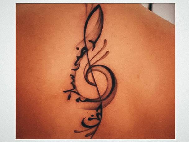 Ravishing Music Tattoo On Female