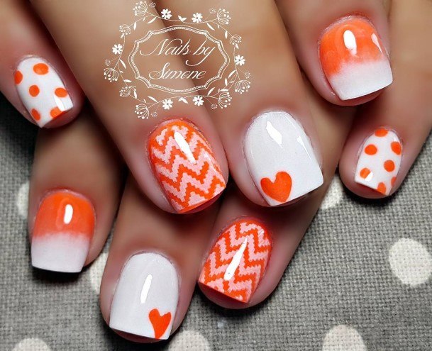 Ravishing Orange And White Nail On Female