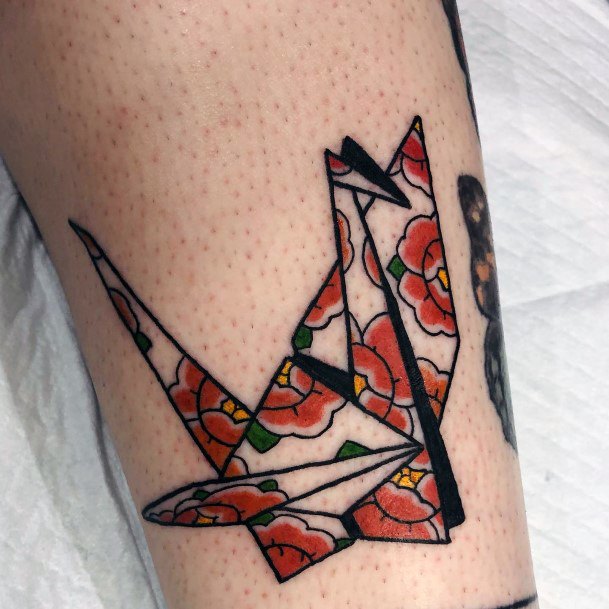 Ravishing Origami Tattoo On Female