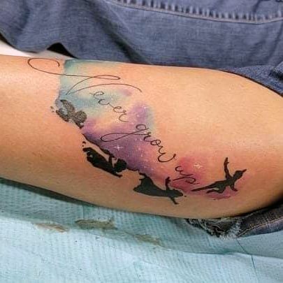 Ravishing Peter Pan Tattoo On Female