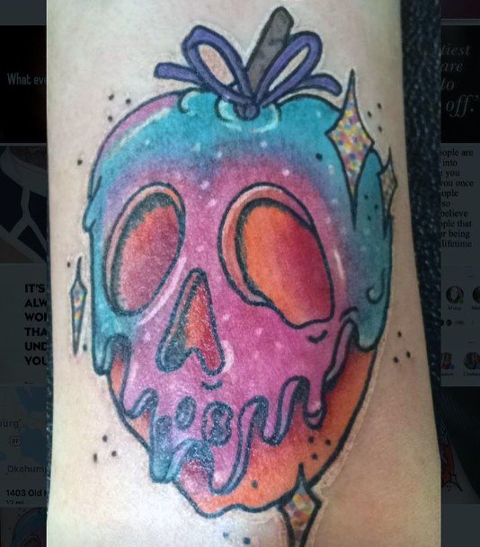 Ravishing Poison Apple Tattoo On Female