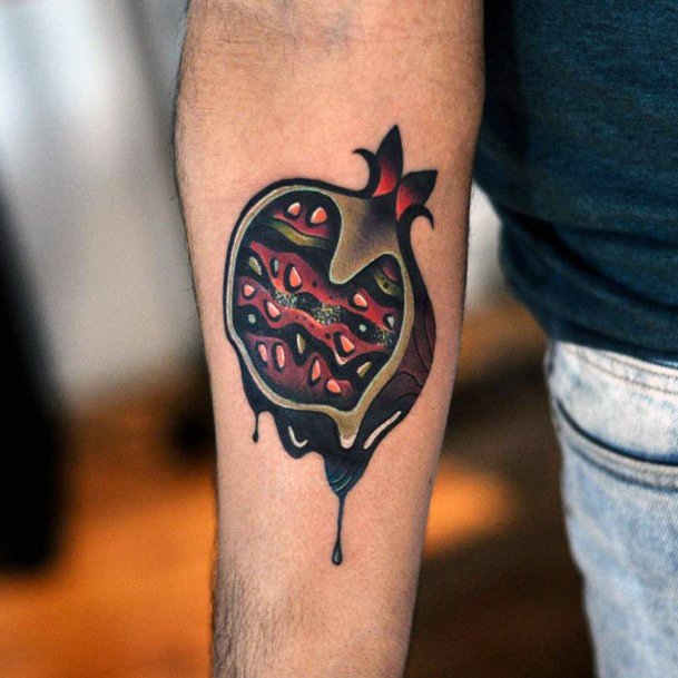 Ravishing Pomegranate Tattoo On Female