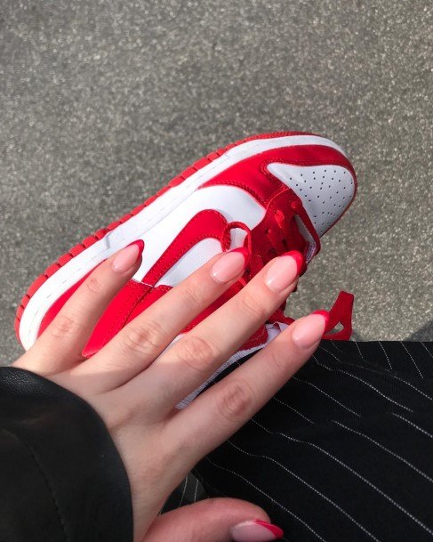 Ravishing Red French Tip Nail On Female