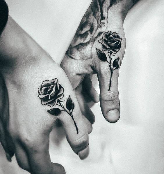 Ravishing Rose Hand Tattoo On Female