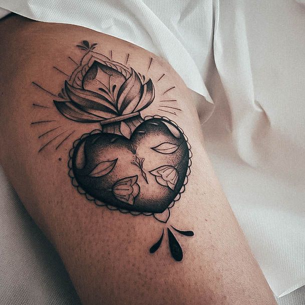 Ravishing Sacred Heart Tattoo On Female