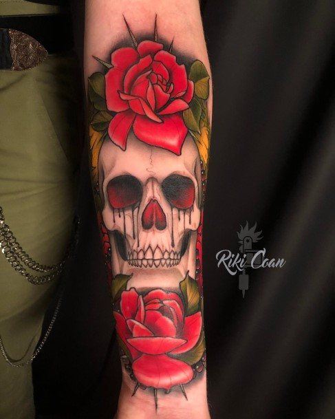 Ravishing Skull And Rose Tattoo On Female