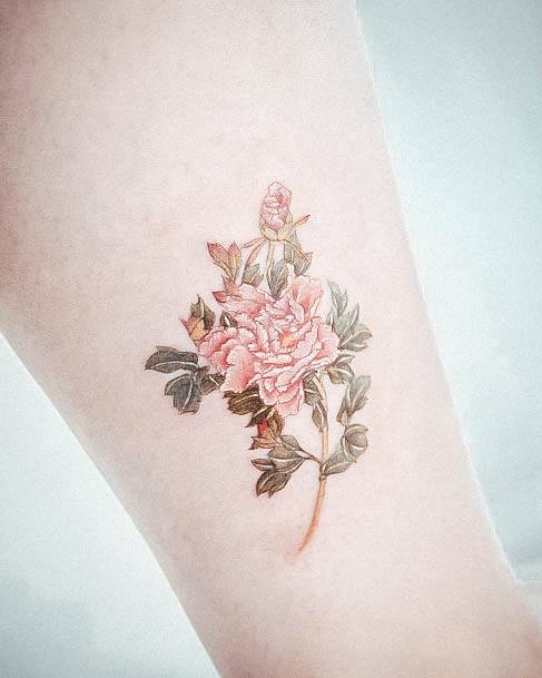 Ravishing Small Flower Tattoo On Female