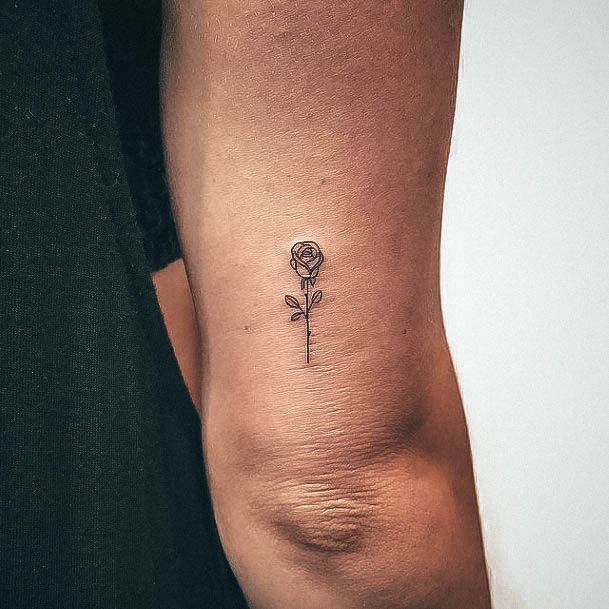 Ravishing Small Rose Tattoo On Female