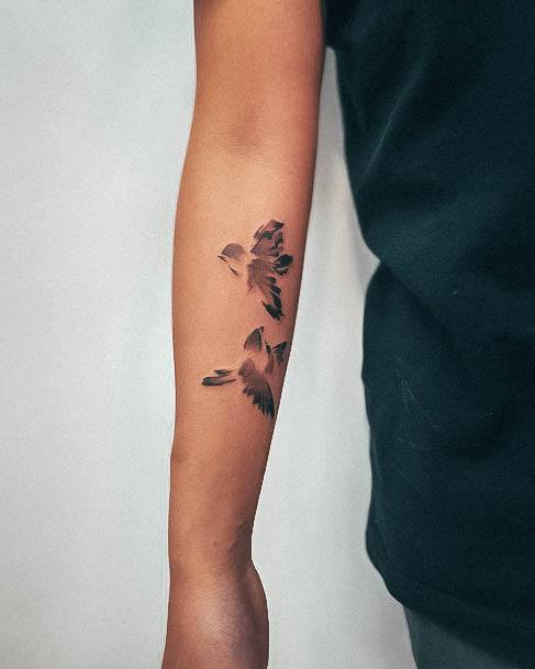 Ravishing Small Sparrow Tattoo On Female