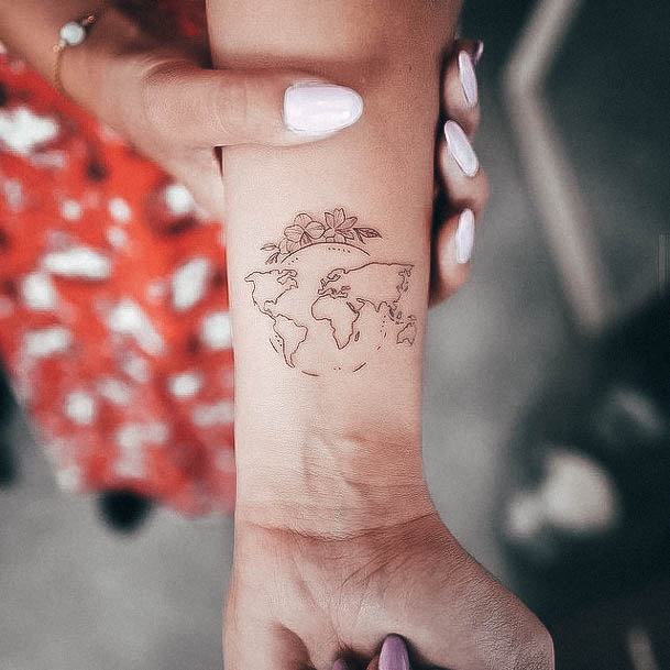 Ravishing Small Wrist Tattoo On Female