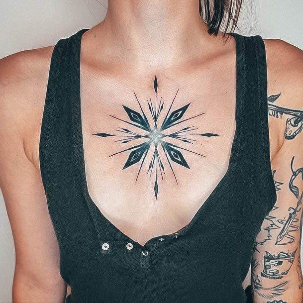 Ravishing Snowflake Tattoo On Female