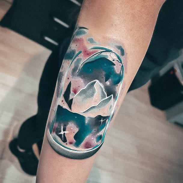 Ravishing Snowglobe Tattoo On Female